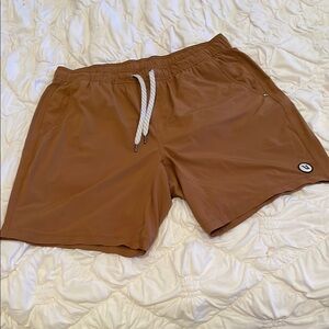 Vuori Men's Athletic Shorts in Tan